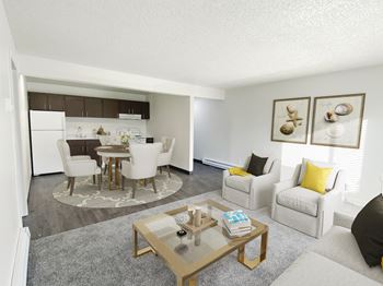 A living room and dining room with a table and chairs
